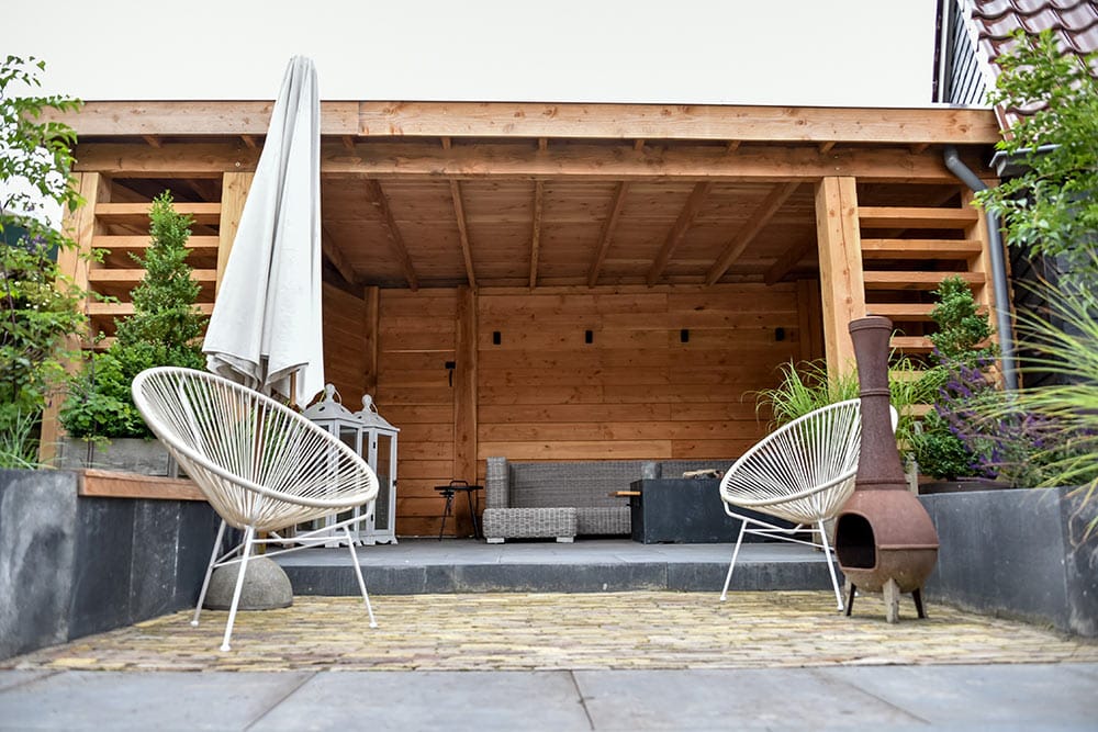 Boos Behoren huurling Moderne tuin met terras en veranda | Booiman Tuinen